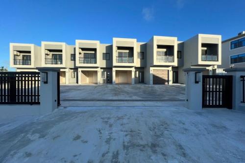 Modern 2-Bedroom Townhome in the Heart of Mangilao – Move-In Ready!