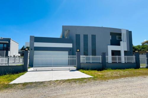 Spacious 4BR Home in Ordot-Chalan Pago – Gated, 2-Story with Garage & Security