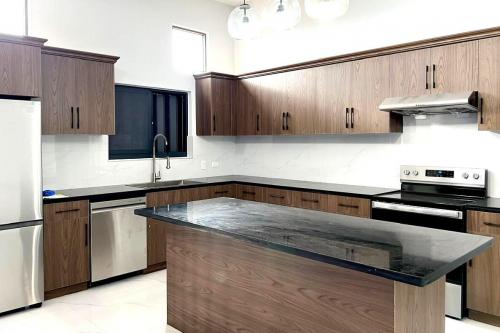 Brand-New 4BR Condo Near NCS & Camp Blaz