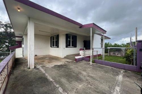 Welcome to this affordable corner house located in Mangilao